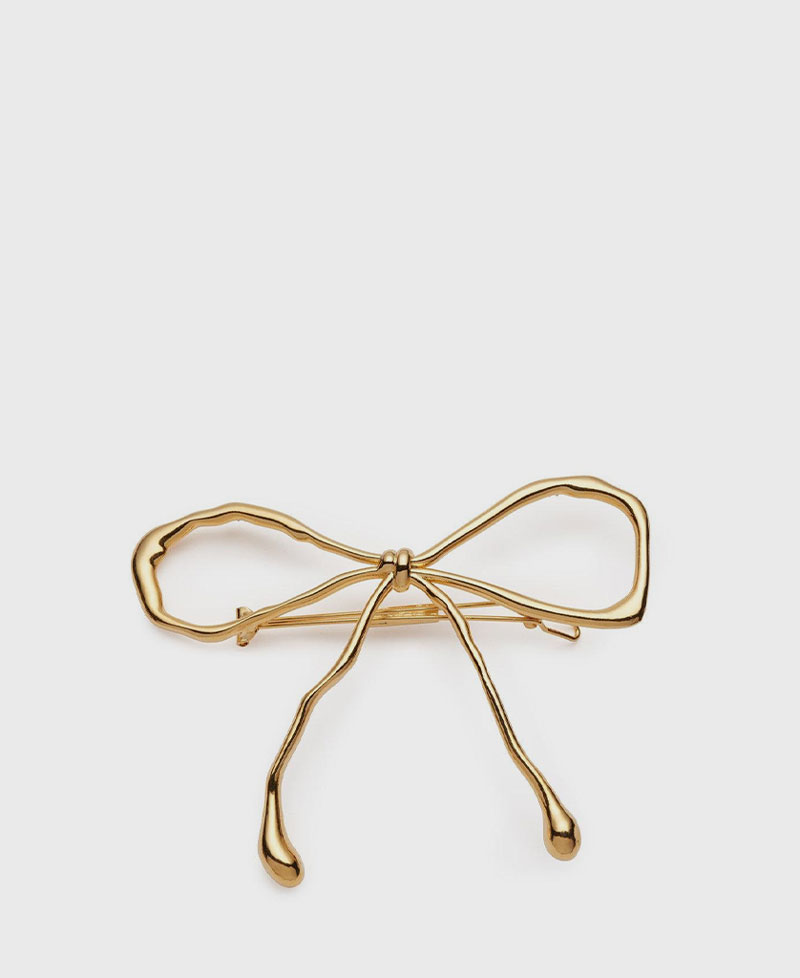 GLOSSY BOW BARRETTE